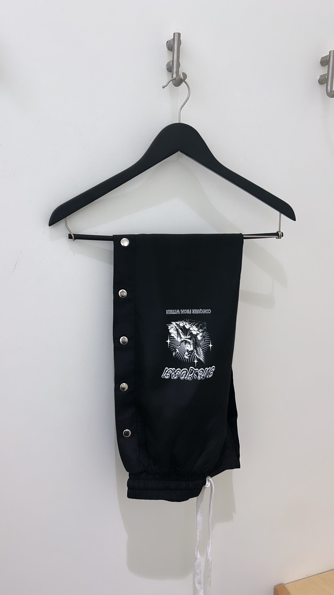 MELIORA CONQUER FROM WITHIN ONYX WINDBREAKER PANTS