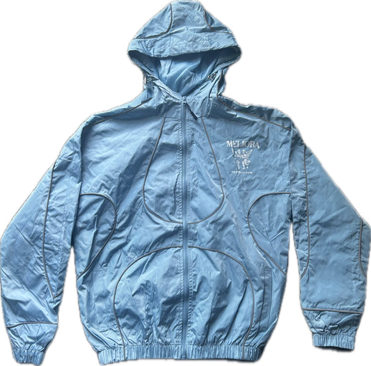 MELIORA THE WORLD IS YOURS SKY BLUE REFLECTIVE WINDBREAKER