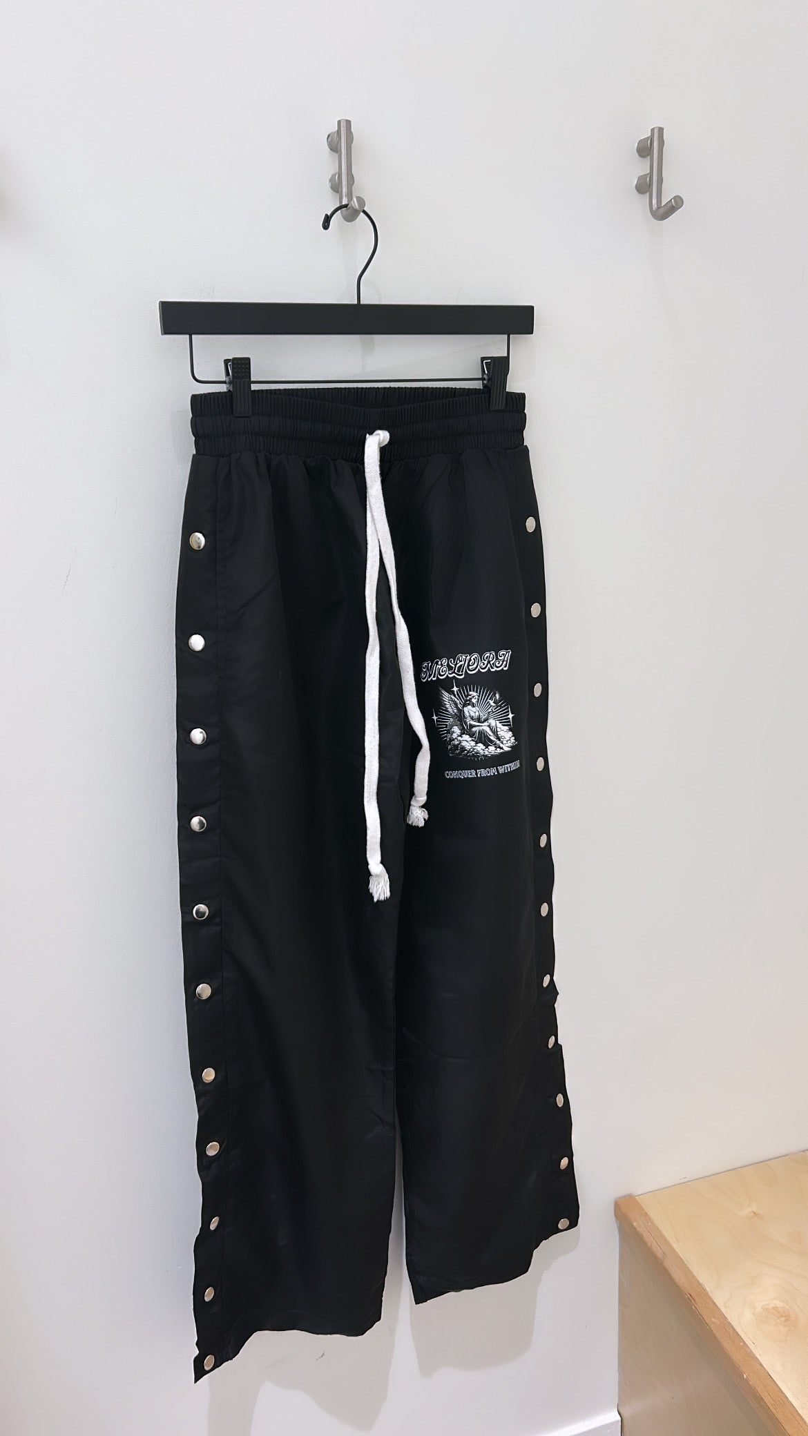 MELIORA CONQUER FROM WITHIN ONYX WINDBREAKER PANTS